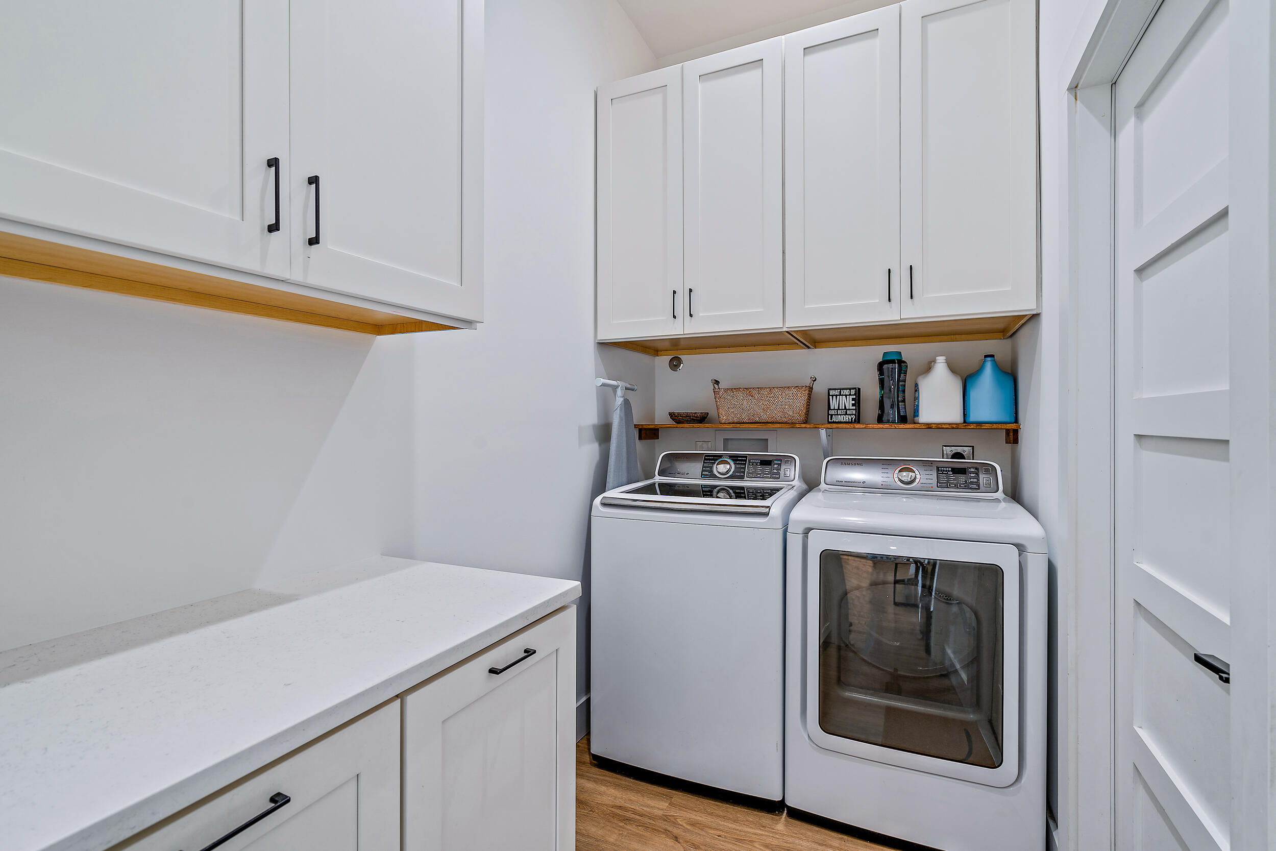 68 Azalea Circle Tequesta, FL 33469 - Photo 27 of 36 a utility room with dryer and washer