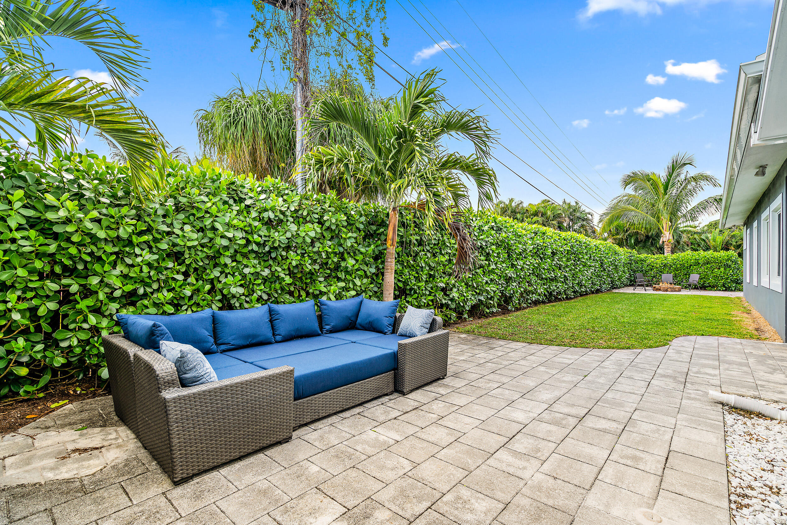 68 Azalea Circle Tequesta, FL 33469 - Photo 29 of 36 a view of a yard with furniture