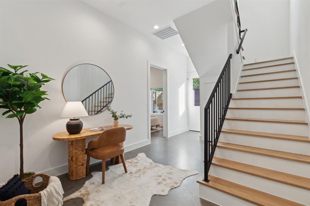 2142 Lovedale Avenue, Unit 104 Dallas, TX 75235 - Photo 4 of 29 a view of entryway livingroom and hall with wooden floor