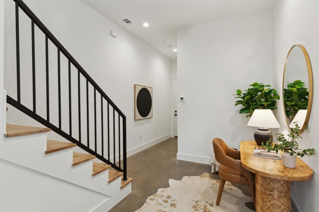 2142 Lovedale Avenue, Unit 104 Dallas, TX 75235 - Photo 5 of 29 a view of a dining room with furniture