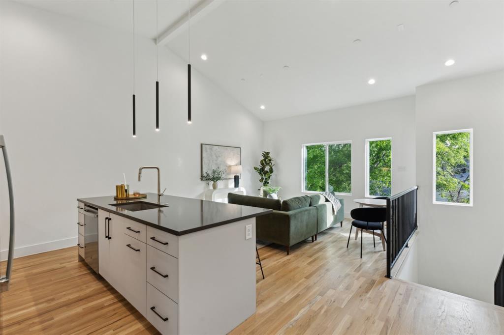 2142 Lovedale Avenue, Unit 104 Dallas, TX 75235 - Photo 10 of 29 a kitchen with sink stove and cabinets