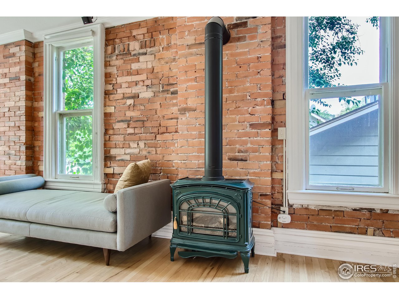 417 Mapleton Avenue, Unit B Boulder, CO 80304 - Photo 11 of 27 a living room with furniture and a window