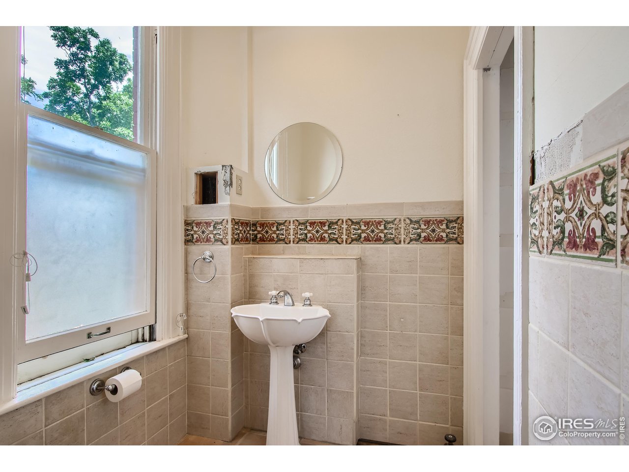 417 Mapleton Avenue, Unit B Boulder, CO 80304 - Photo 21 of 27 a bathroom with a sink mirror and shower