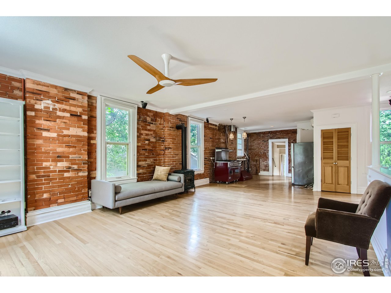 417 Mapleton Avenue, Unit B Boulder, CO 80304 - Photo 8 of 27 a living room with furniture and a large window
