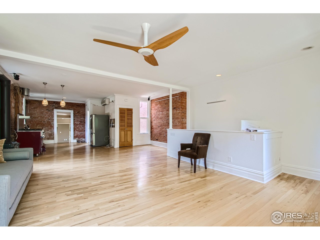 417 Mapleton Avenue, Unit B Boulder, CO 80304 - Photo 9 of 27 a view of a livingroom with furniture wooden floor and a window