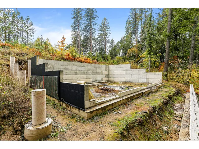 a view of a swimming pool with a yard