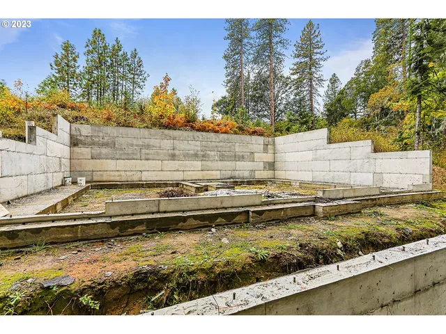 a picture of a bathroom next to a white wall