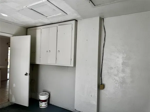 a view of bathroom with a toilet a sink and a shower