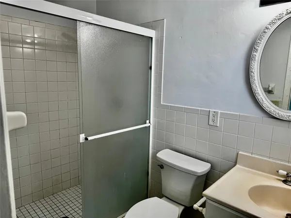 a bathroom with a toilet and a sink