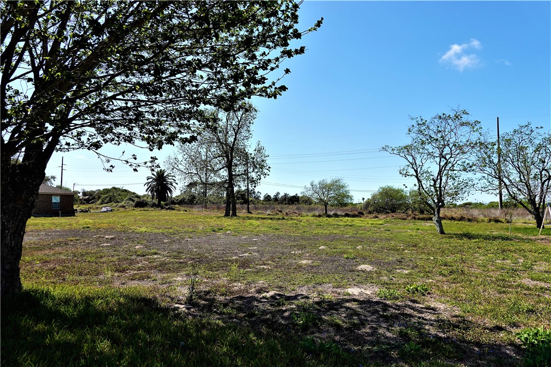 627 8th Street Ingleside, TX 78362 - Photo 1 of 14 a view of a field with trees