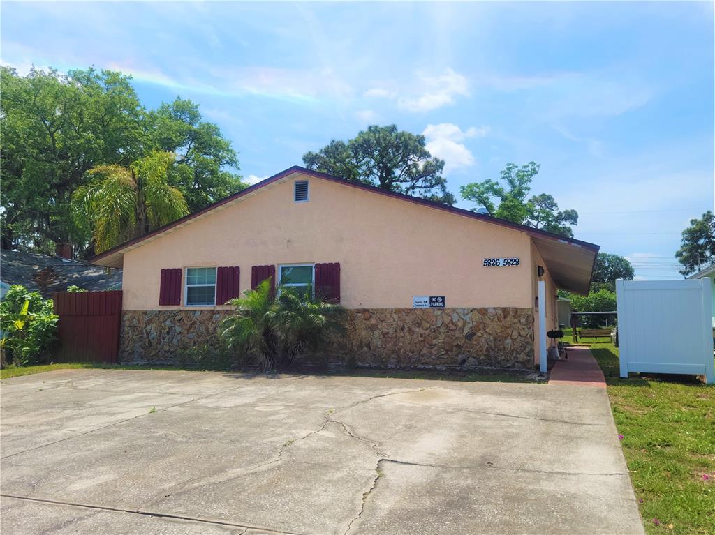 5826 Gulf Drive New Port Richey, FL 34652 - Photo 1 of 1 Street View with parking.
