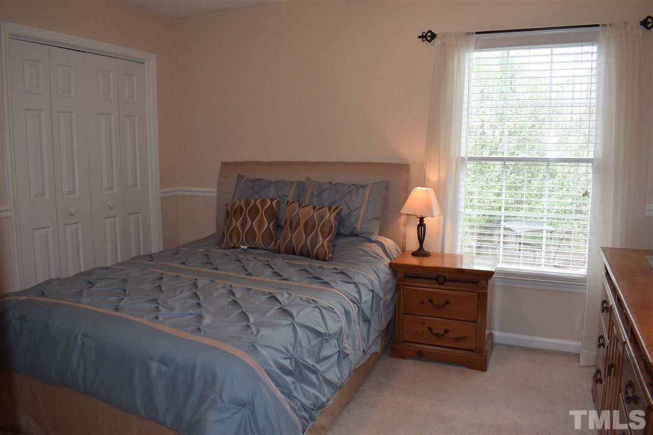 5200 Calverton Drive Raleigh, NC 27613 - Photo 16 of 25 Third bedroom has 2 large closets.