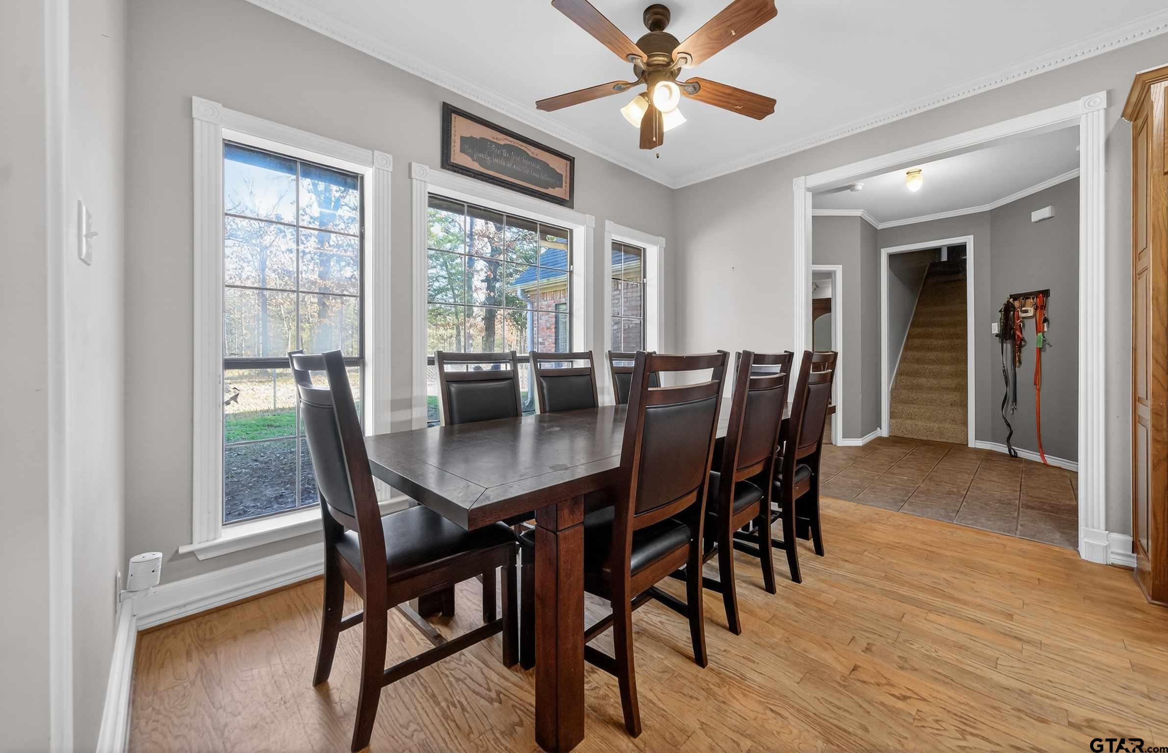 781 Highway 19 Edgewood, TX 75117 - Photo 14 of 48 a view of a dining room with furniture window and wooden floor