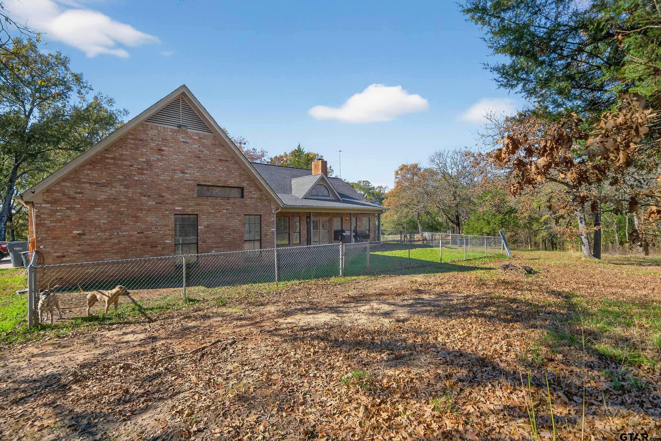 781 Highway 19 Edgewood, TX 75117 - Photo 43 of 48 a backyard of a house with lots of green space