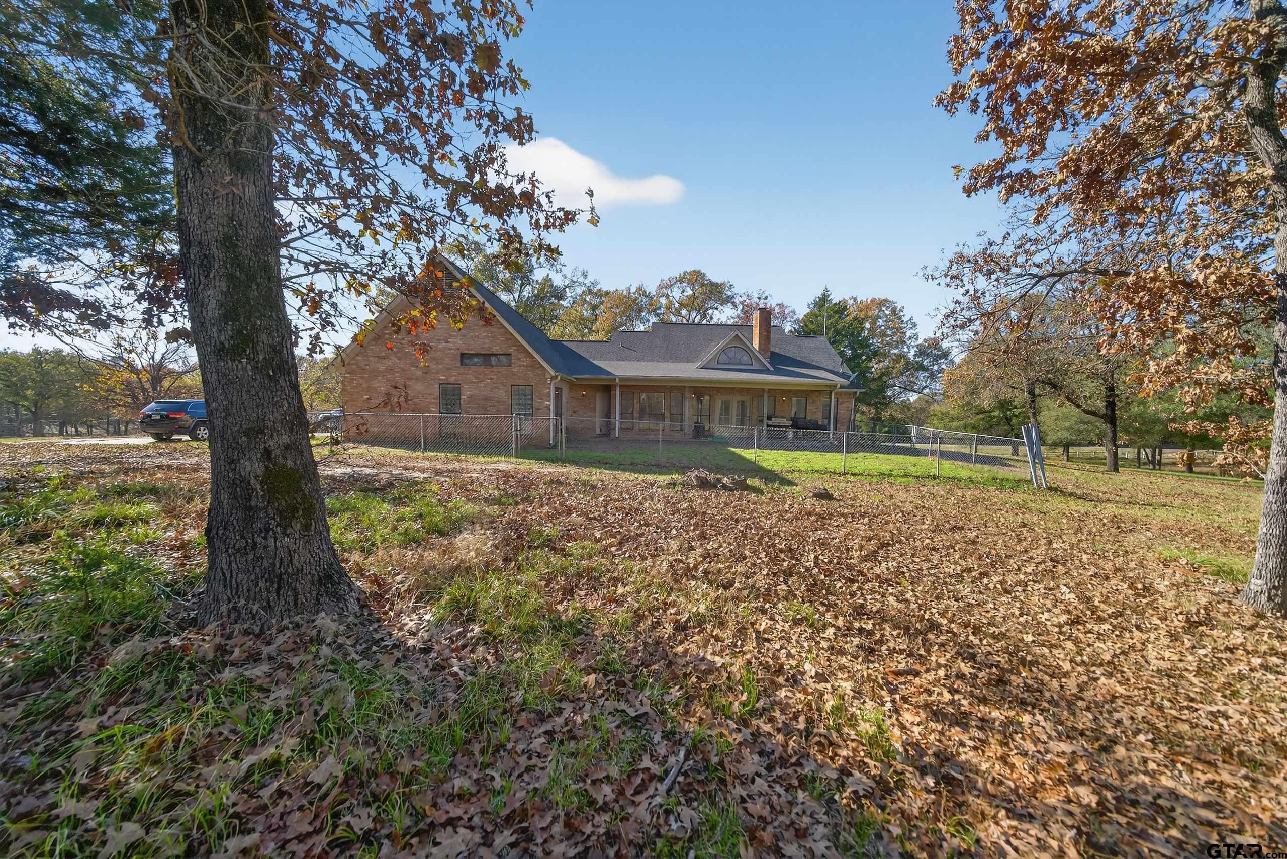 781 Highway 19 Edgewood, TX 75117 - Photo 44 of 48 a backyard of a house with lots of green space