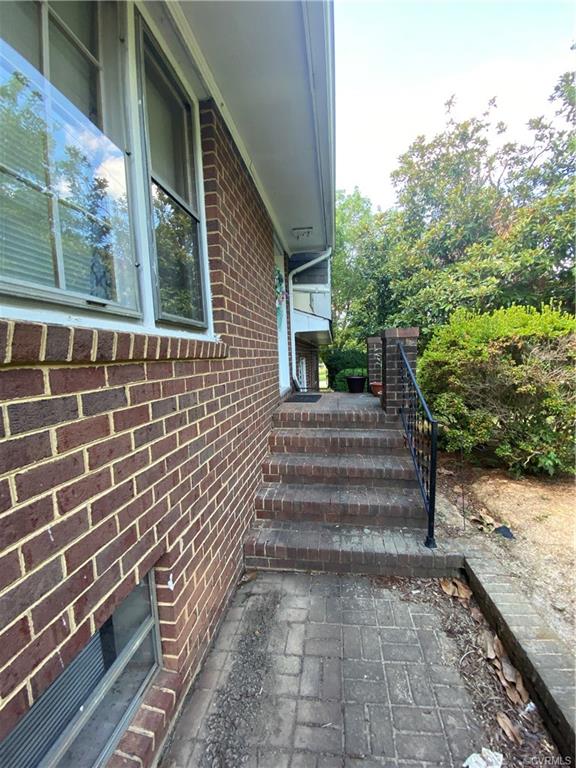 241 Nottoway Falls Road Kenbridge, VA 23944 - Photo 3 of 29 a view of a pathway with a building in the background