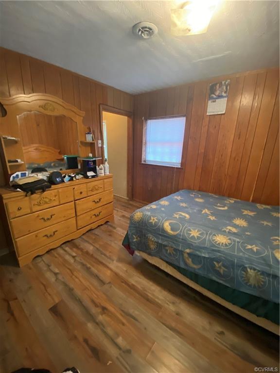 241 Nottoway Falls Road Kenbridge, VA 23944 - Photo 26 of 29 a bedroom with a bed and window