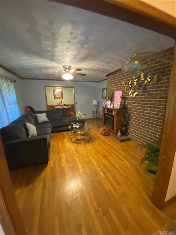 241 Nottoway Falls Road Kenbridge, VA 23944 - Photo 5 of 29 a living room with furniture and a flat screen tv