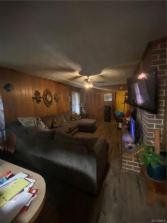 241 Nottoway Falls Road Kenbridge, VA 23944 - Photo 7 of 29 a living room with furniture and a flat screen tv