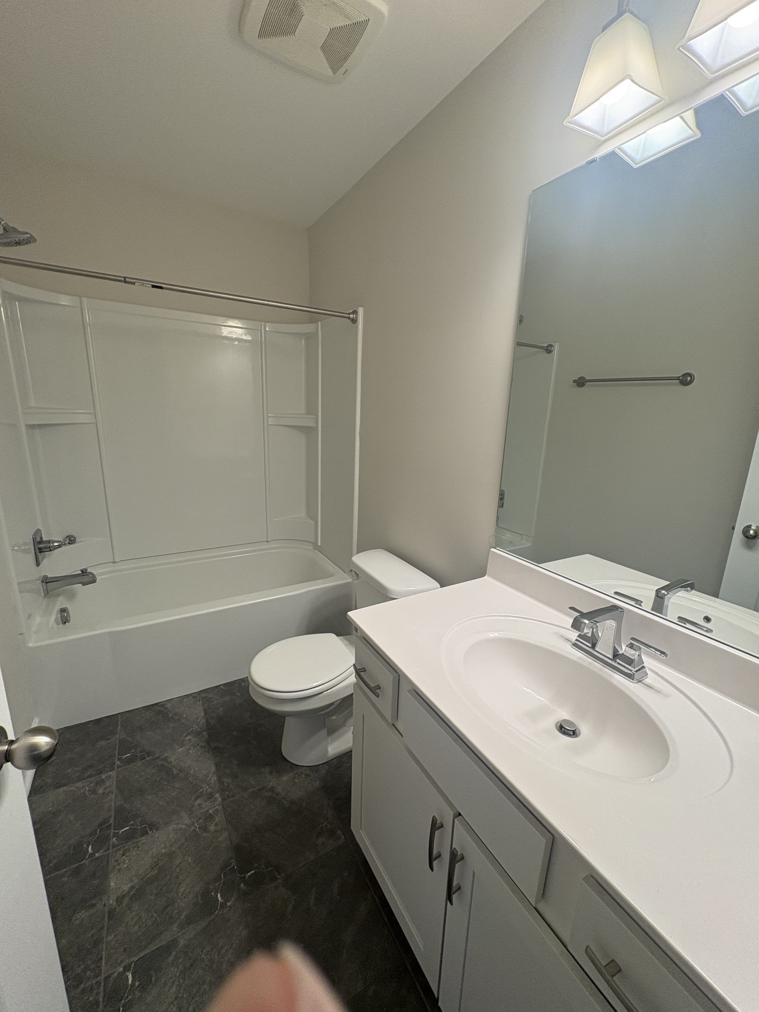 422 Butler Road Mount Juliet, TN 37122 - Photo 19 of 28 a bathroom with a sink a toilet and shower