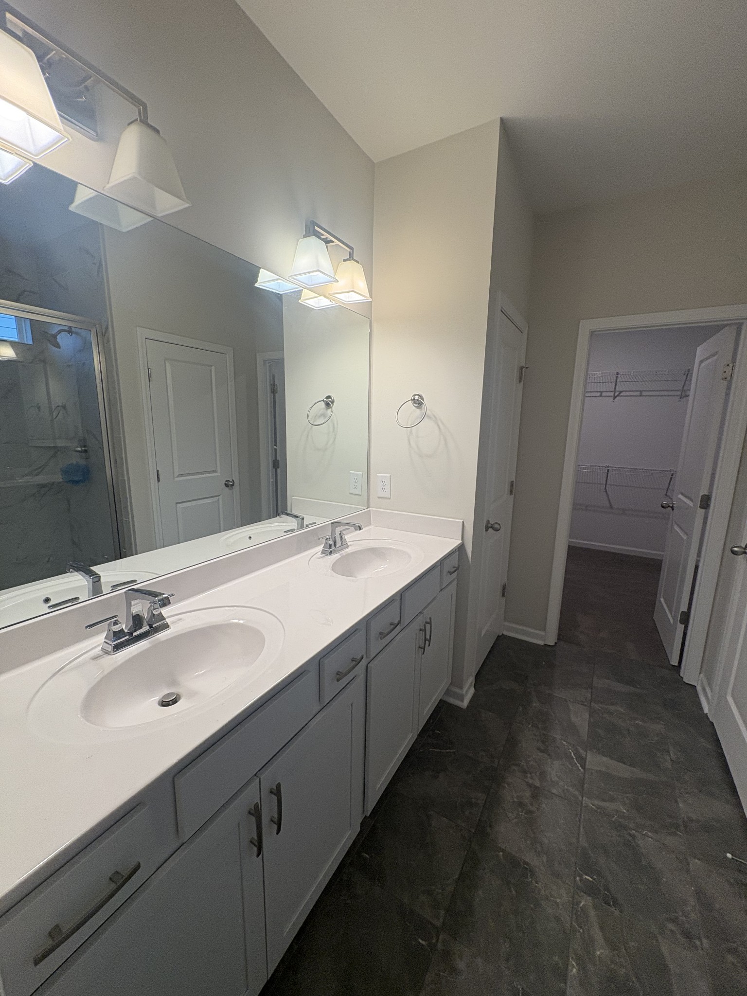 422 Butler Road Mount Juliet, TN 37122 - Photo 22 of 28 a spacious bathroom with a double vanity sink and mirror