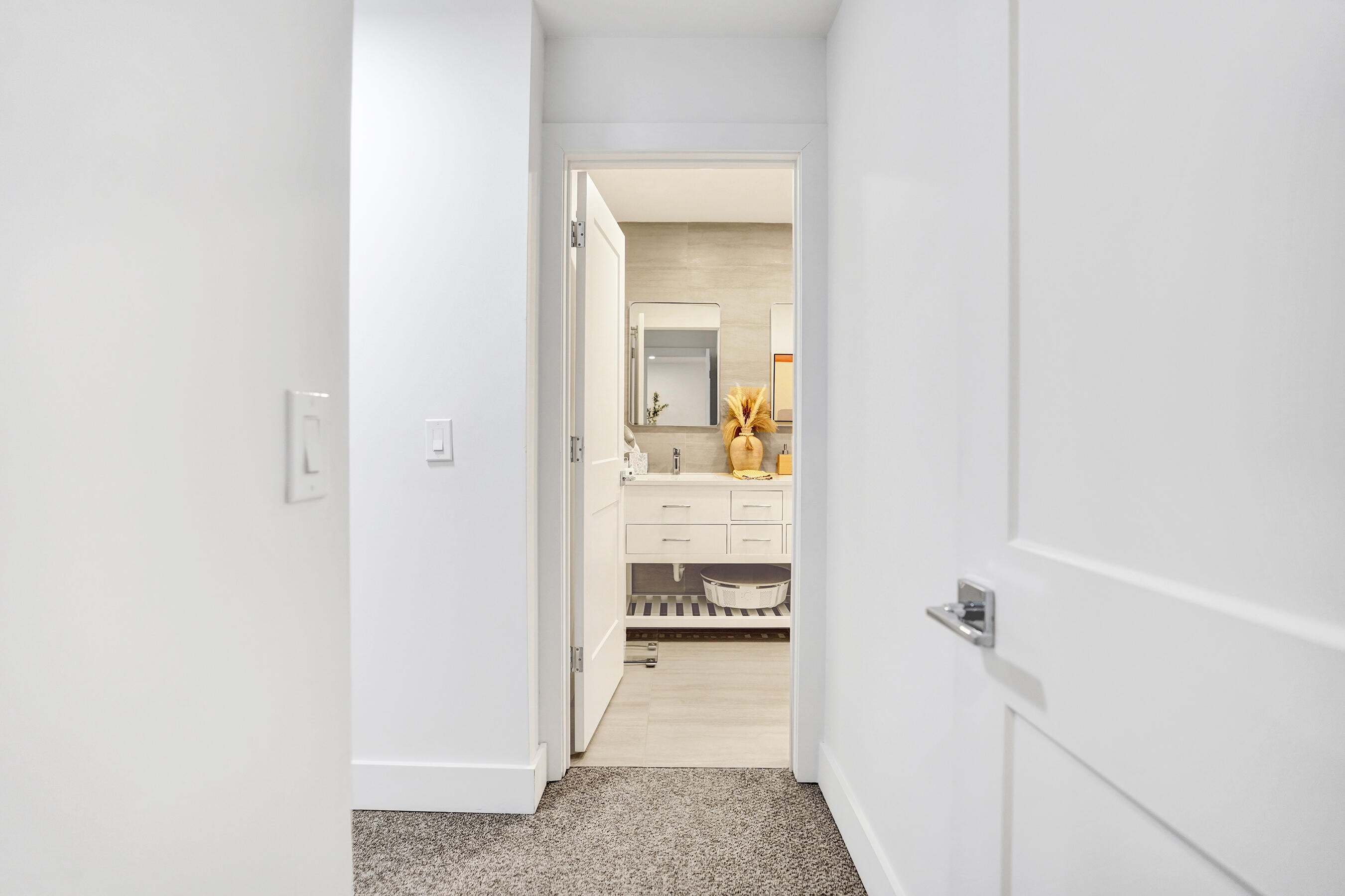 9293 Vista Del Lago, Unit 15F Boca Raton, FL 33428 - Photo 14 of 42 a bathroom with a sink and a mirror