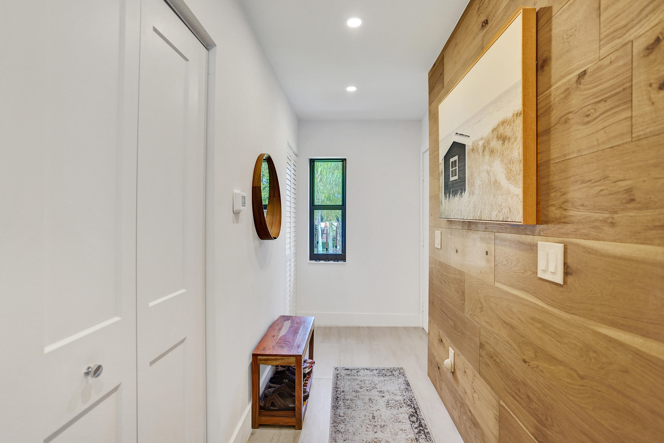 9293 Vista Del Lago, Unit 15F Boca Raton, FL 33428 - Photo 24 of 42 a bathroom with a tub and shower curtain