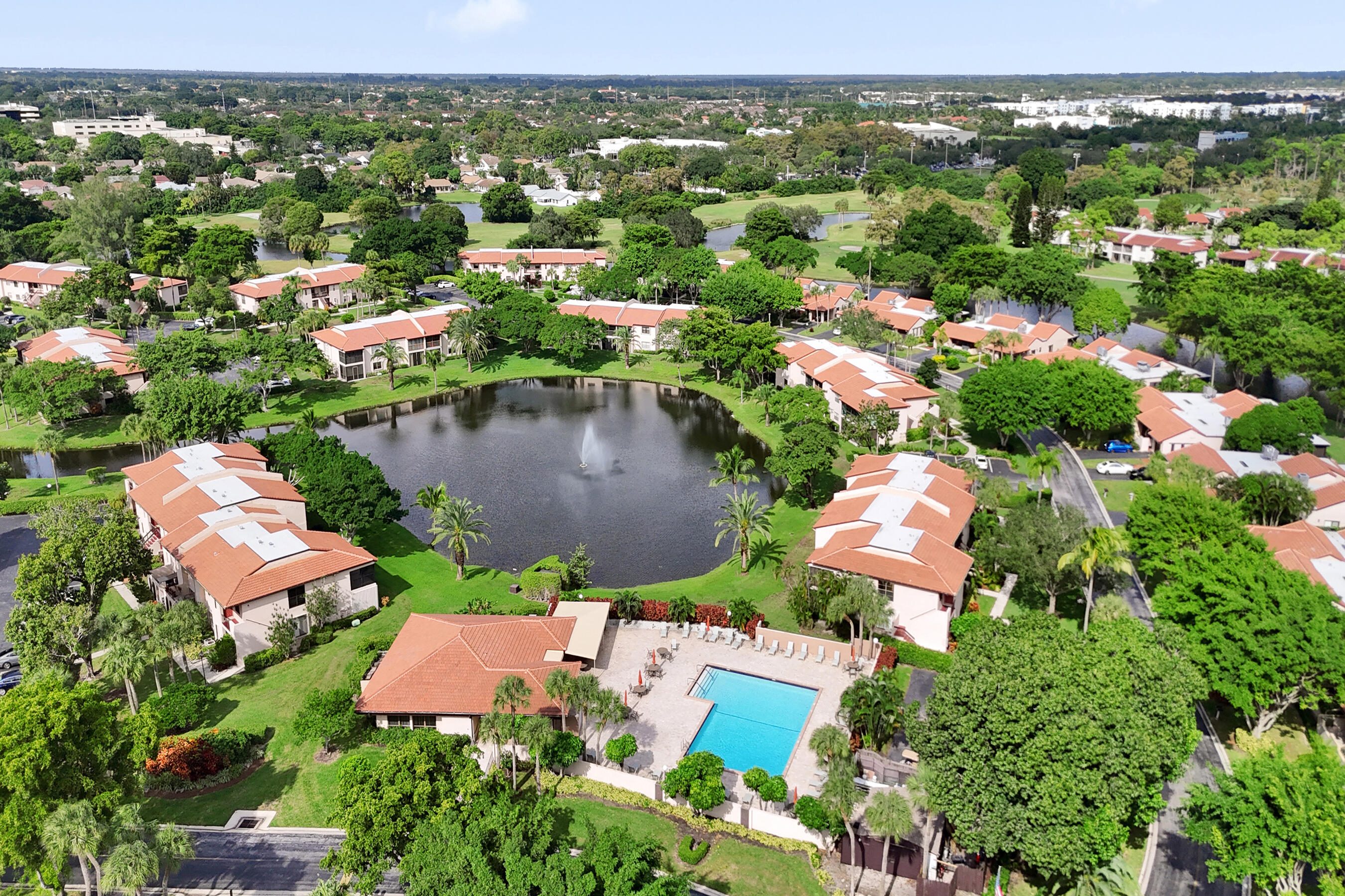 9293 Vista Del Lago, Unit 15F Boca Raton, FL 33428 - Photo 32 of 42 an aerial view of residential houses with outdoor space