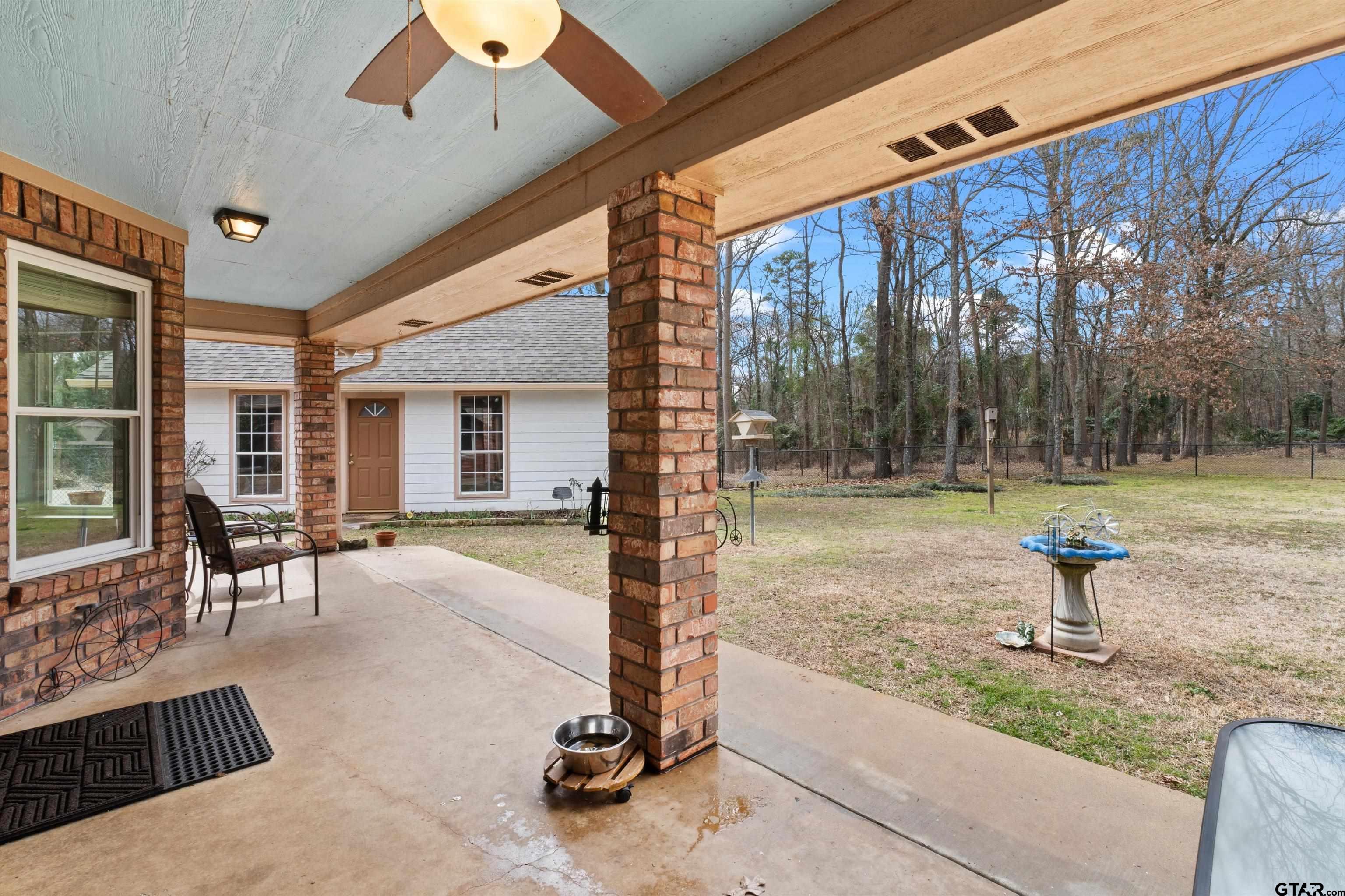 20 County Road 2938 South Pittsburg, TX 75686 - Photo 22 of 27 a front view of a house with garden