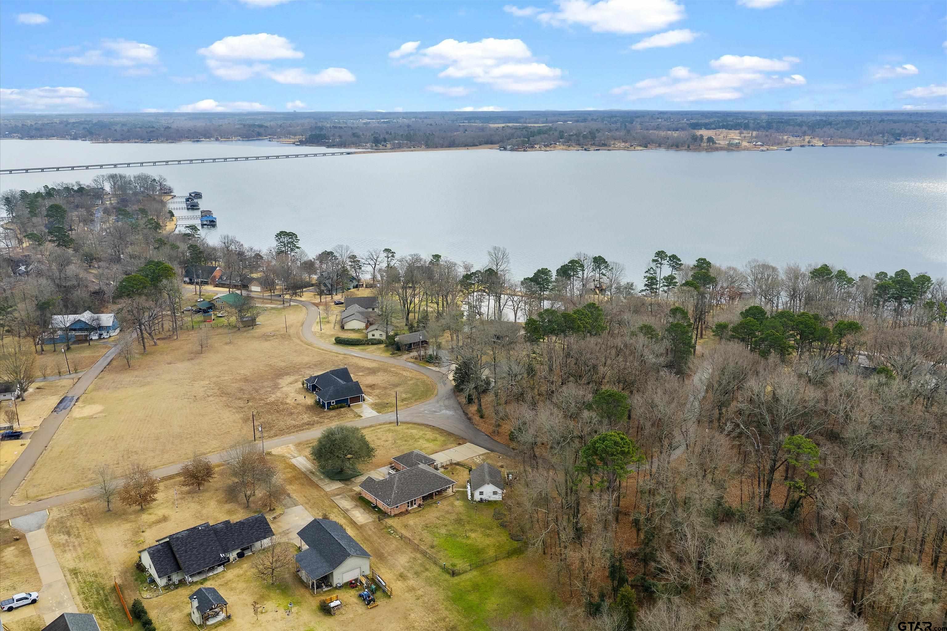 20 County Road 2938 South Pittsburg, TX 75686 - Photo 3 of 27 a view of a lake with outdoor space