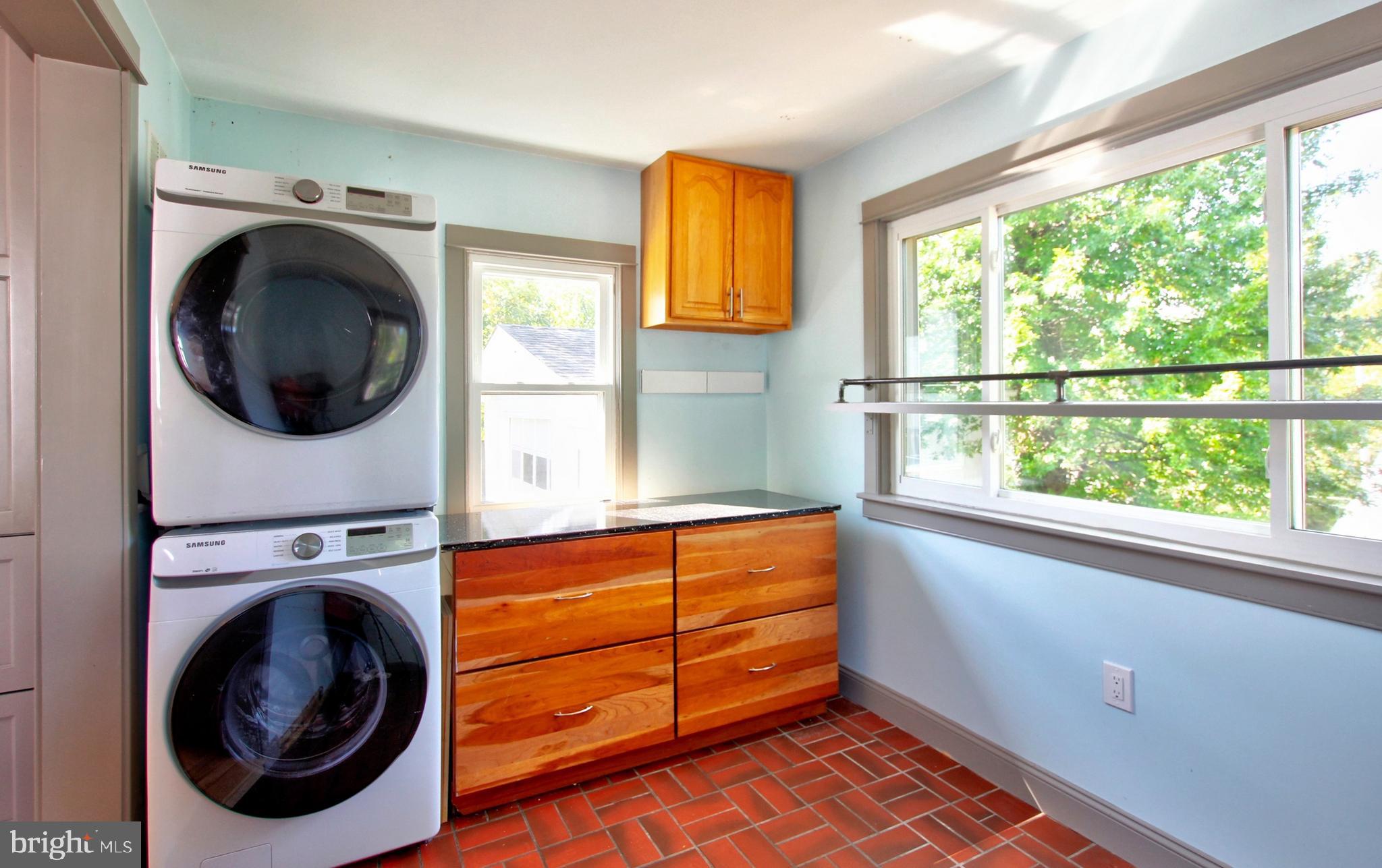 11808 Goodloe Road Silver Spring, MD 20906 - Photo 18 of 57 a view of a hallway with washer and dryer