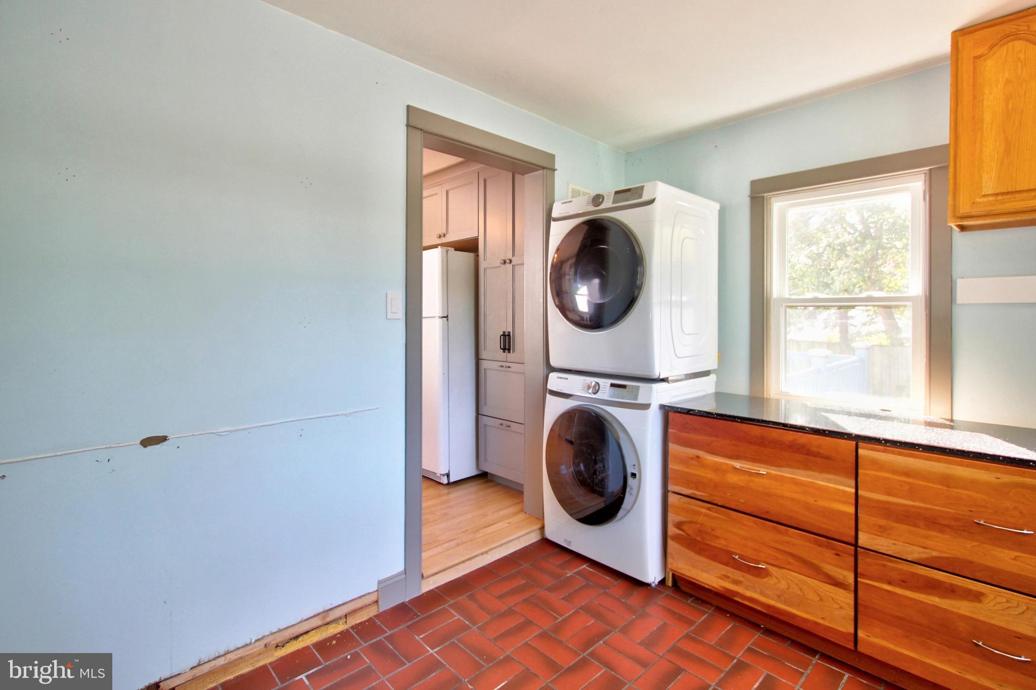 11808 Goodloe Road Silver Spring, MD 20906 - Photo 20 of 57 a utility room with dryer and washer