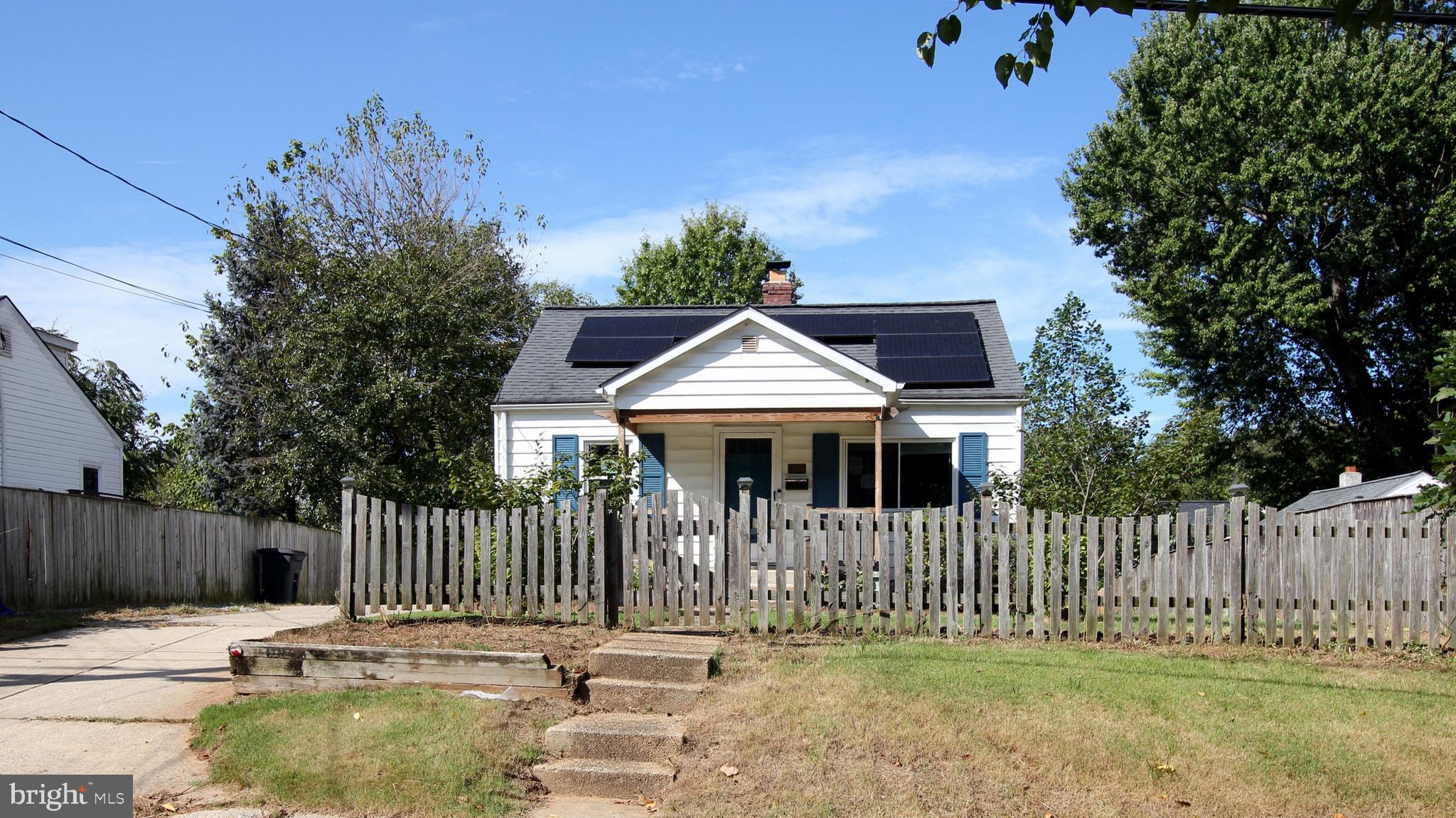 11808 Goodloe Road Silver Spring, MD 20906 - Photo 2 of 57 a white house that has tree in front of it