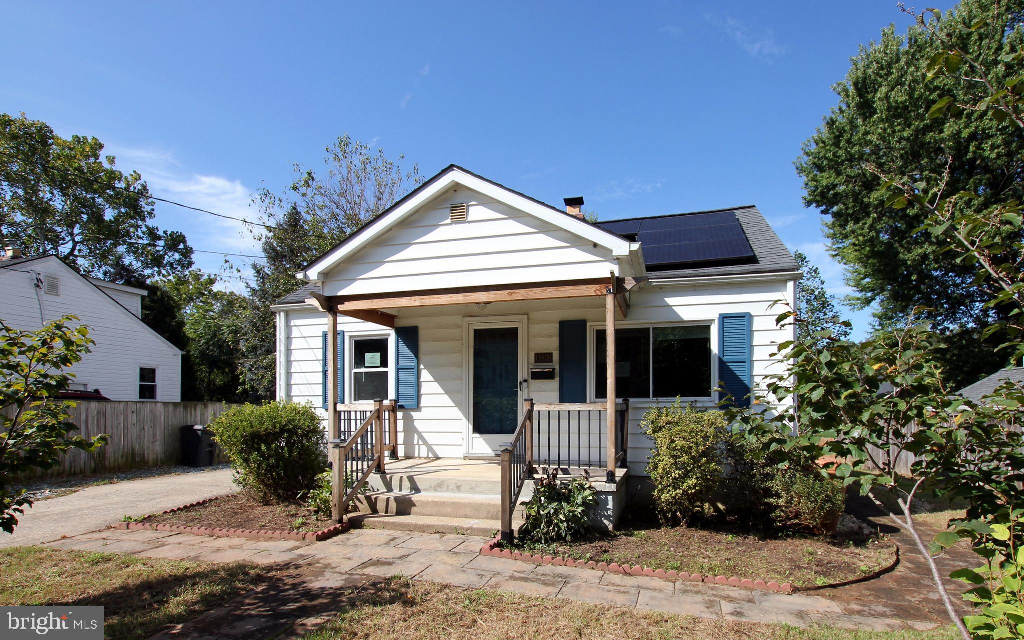 11808 Goodloe Road Silver Spring, MD 20906 - Photo 3 of 57 a front view of a house with garden