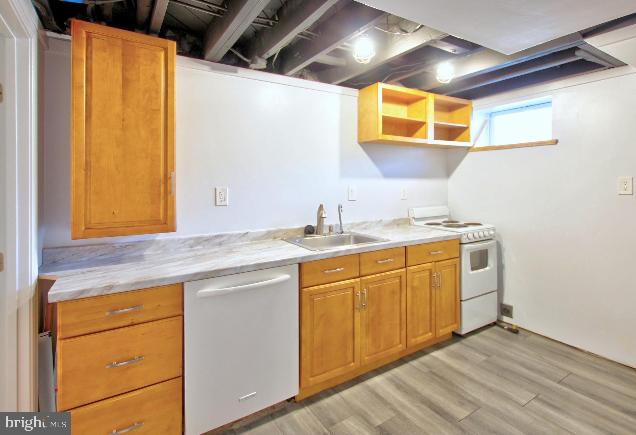 11808 Goodloe Road Silver Spring, MD 20906 - Photo 34 of 57 a bathroom with a sink and a mirror