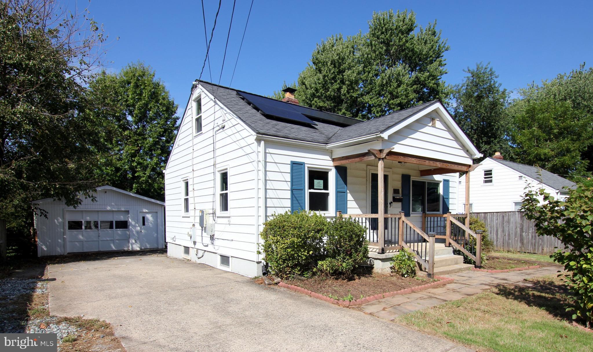 11808 Goodloe Road Silver Spring, MD 20906 - Photo 4 of 57 a view of a house with a yard and potted plants