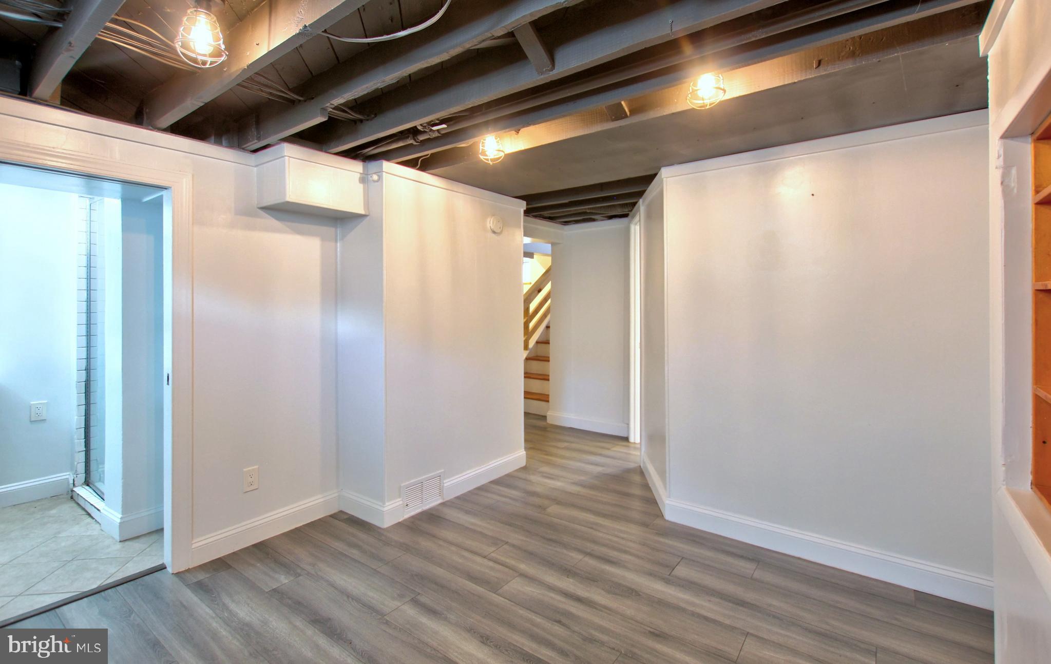 11808 Goodloe Road Silver Spring, MD 20906 - Photo 41 of 57 a view of hallway with wooden floor