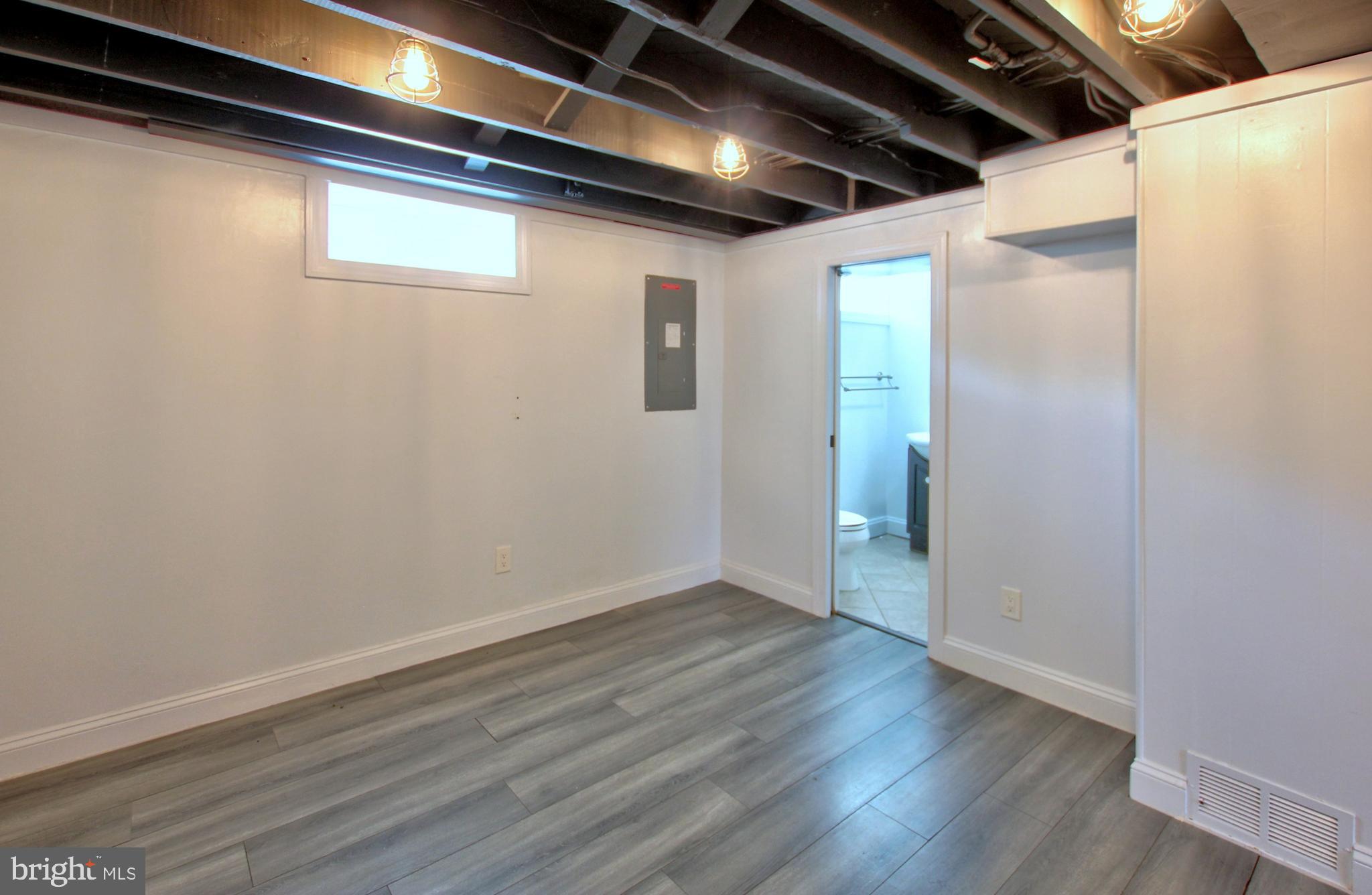 11808 Goodloe Road Silver Spring, MD 20906 - Photo 43 of 57 a view of hallway with wooden floor