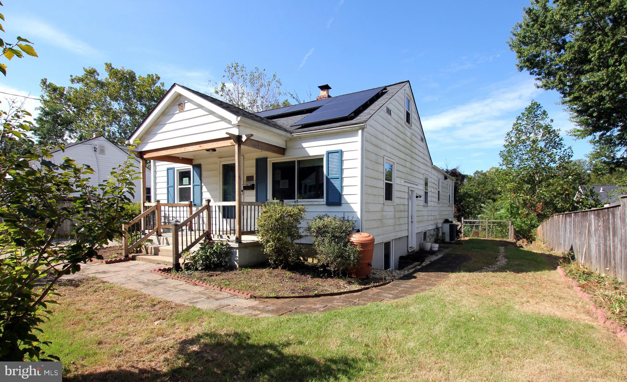 11808 Goodloe Road Silver Spring, MD 20906 - Photo 5 of 57 a front view of a house with a yard