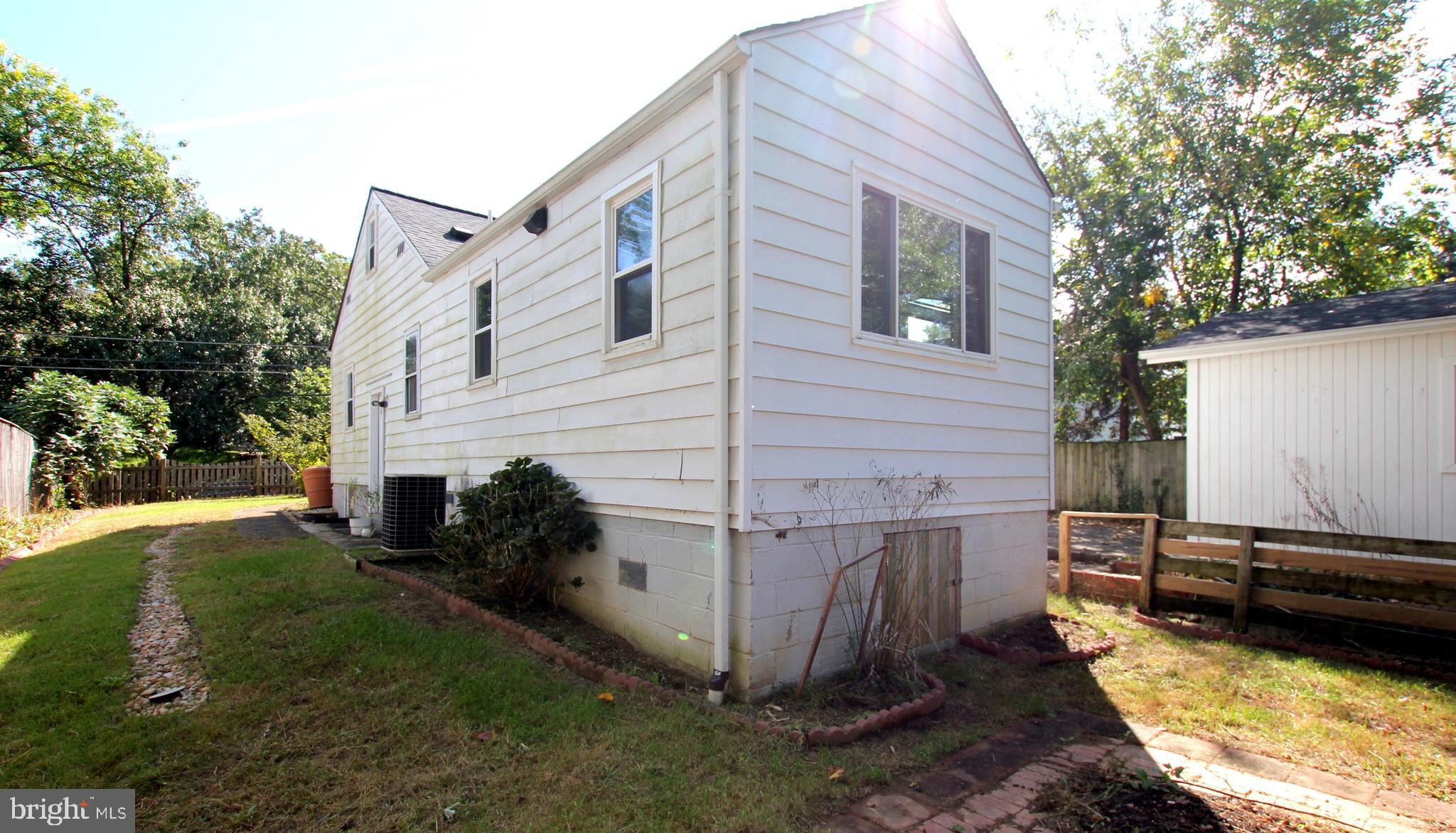 11808 Goodloe Road Silver Spring, MD 20906 - Photo 55 of 57 a view of a house with backyard and sitting area