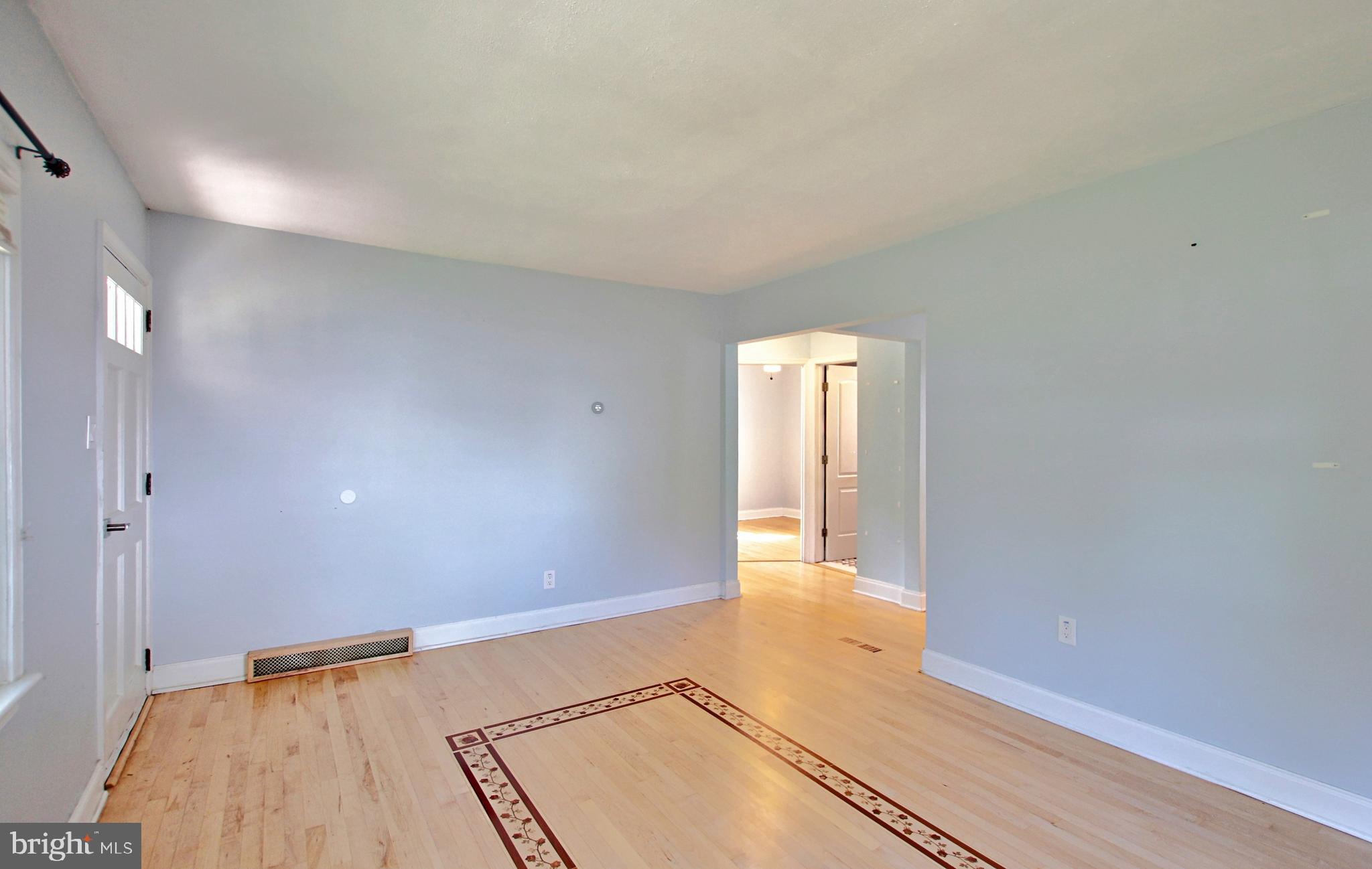 11808 Goodloe Road Silver Spring, MD 20906 - Photo 8 of 57 a view of hallway with wooden floor