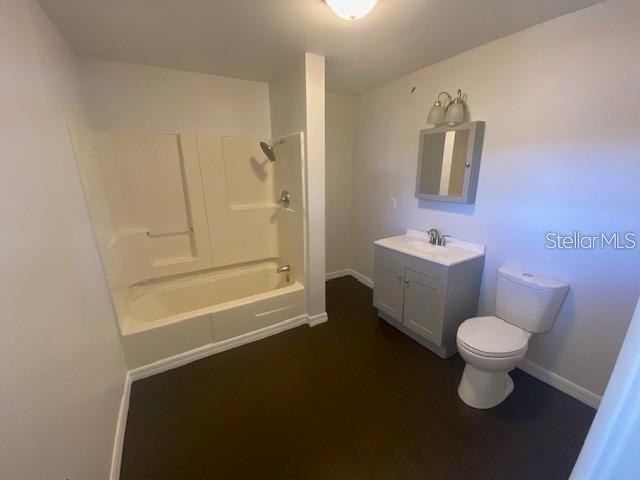 373 East Waldo Street Groveland, FL 34736 - Photo 22 of 23 a bathroom with a sink a toilet and shower