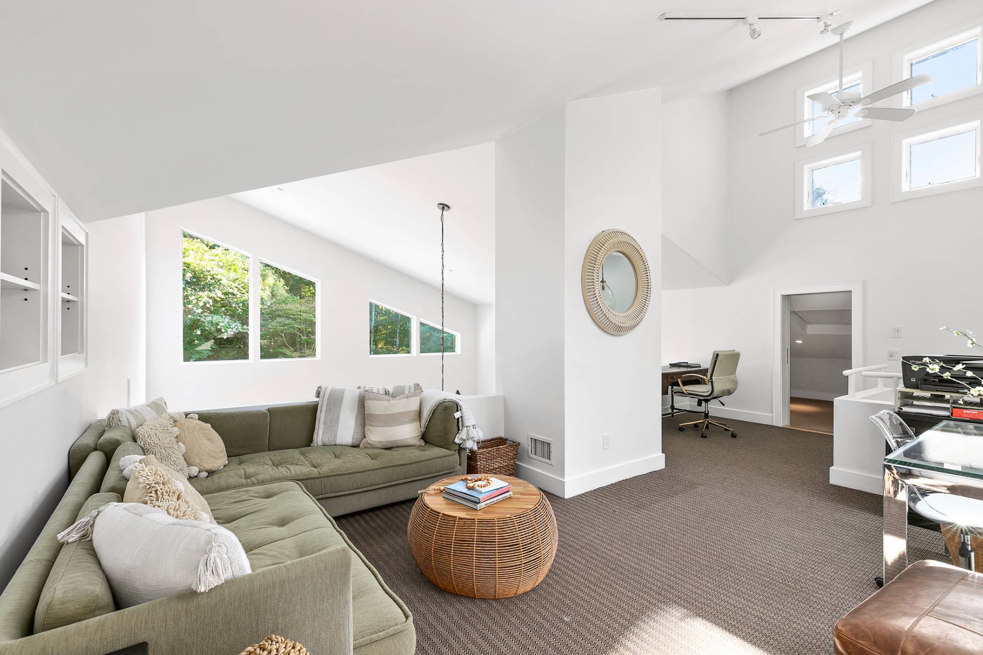 570 Rte 114 East Hampton, NY 11937 - Photo 18 of 30 a living room with furniture a rug and a window
