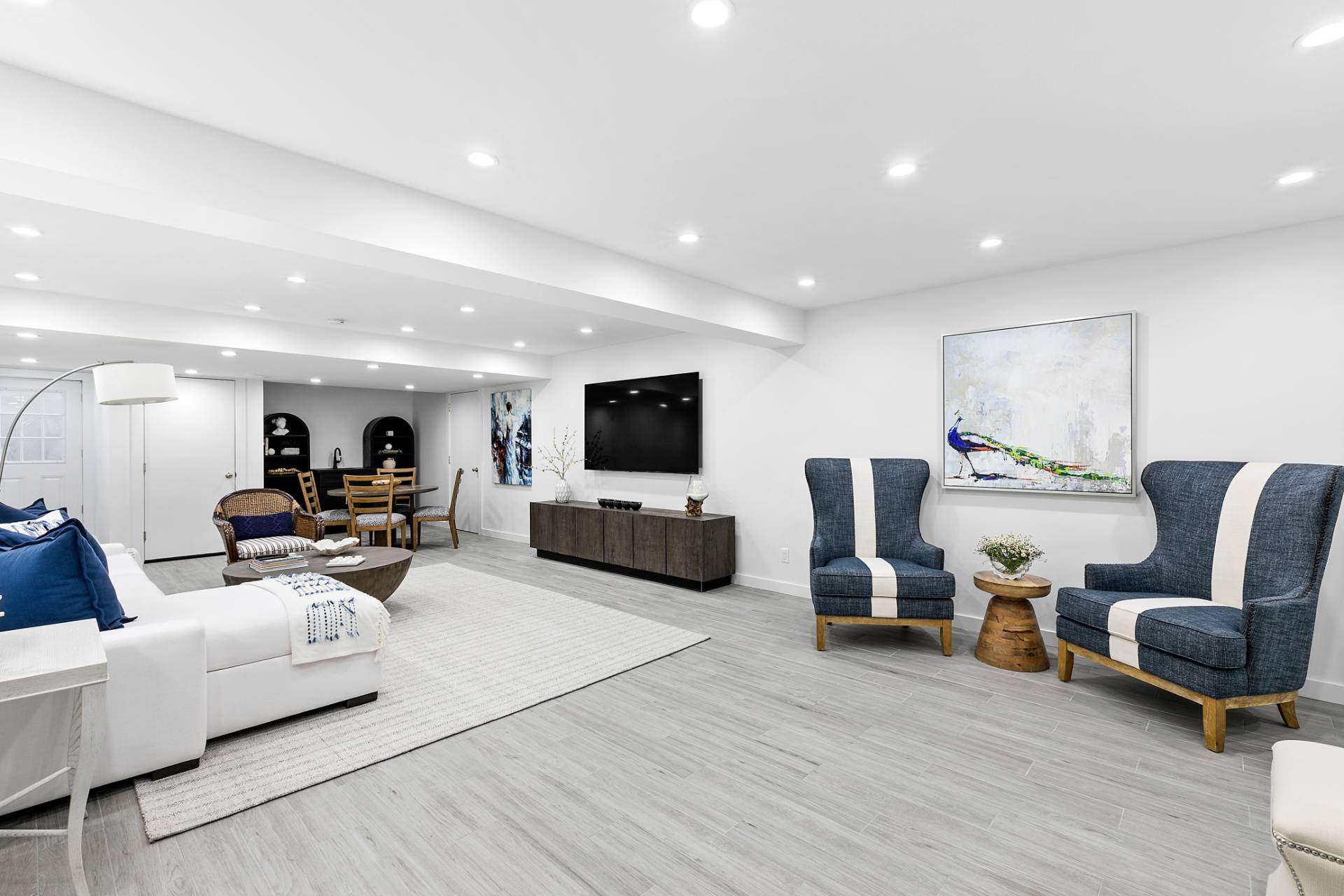 570 Rte 114 East Hampton, NY 11937 - Photo 19 of 30 a living room with furniture and a flat screen tv