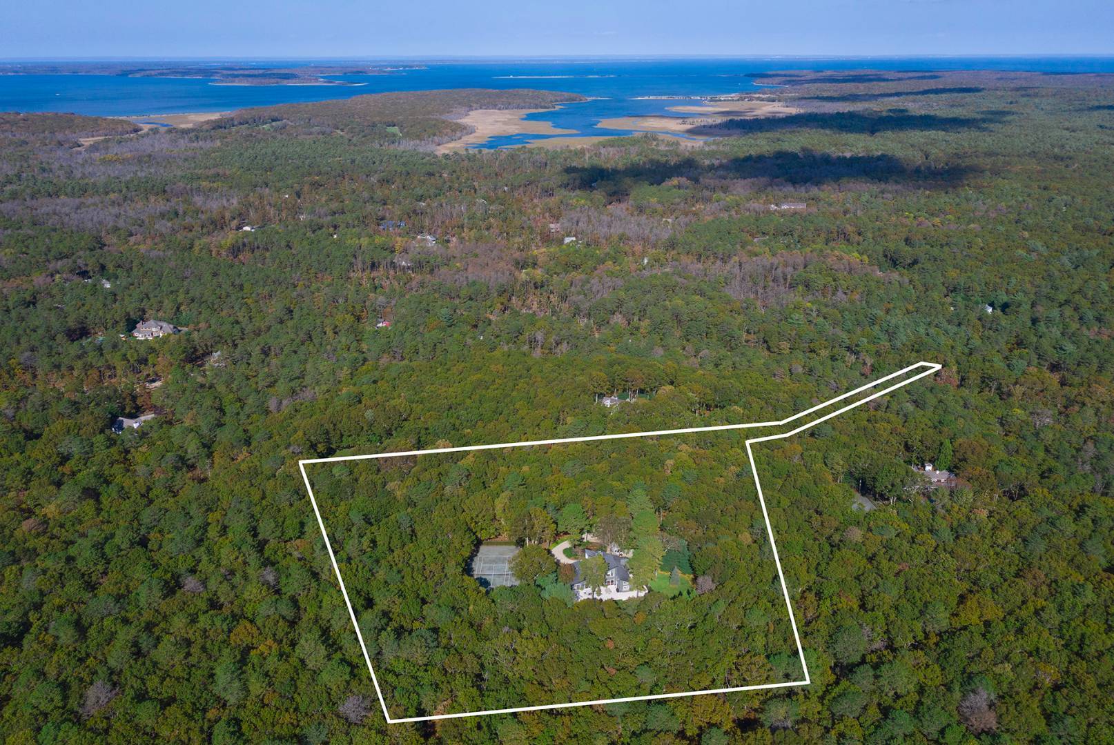 570 Rte 114 East Hampton, NY 11937 - Photo 2 of 30 a view of a tennis court