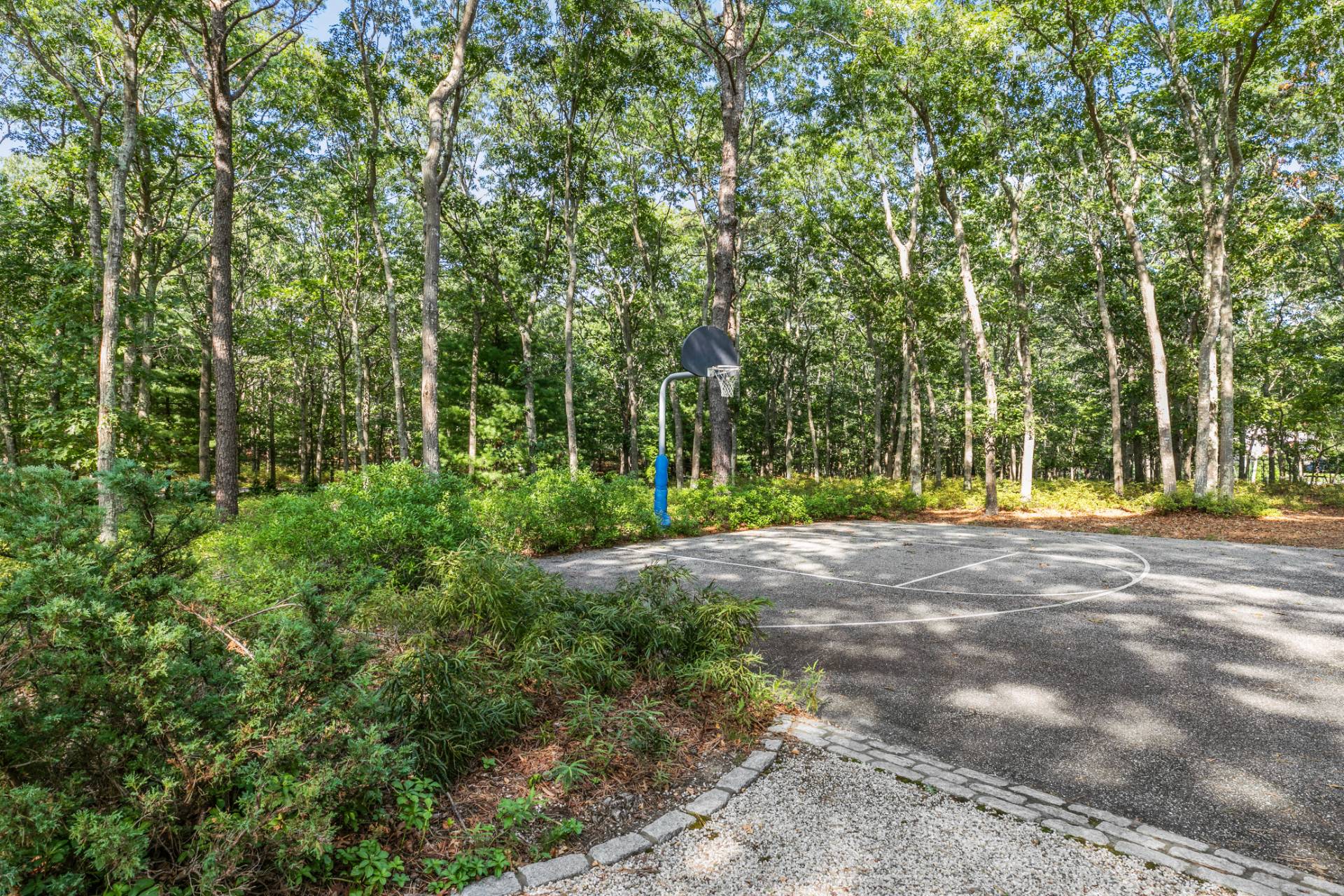 570 Rte 114 East Hampton, NY 11937 - Photo 25 of 30 a view of outdoor space with trees