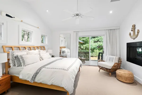 a bed room with a bed and a couch