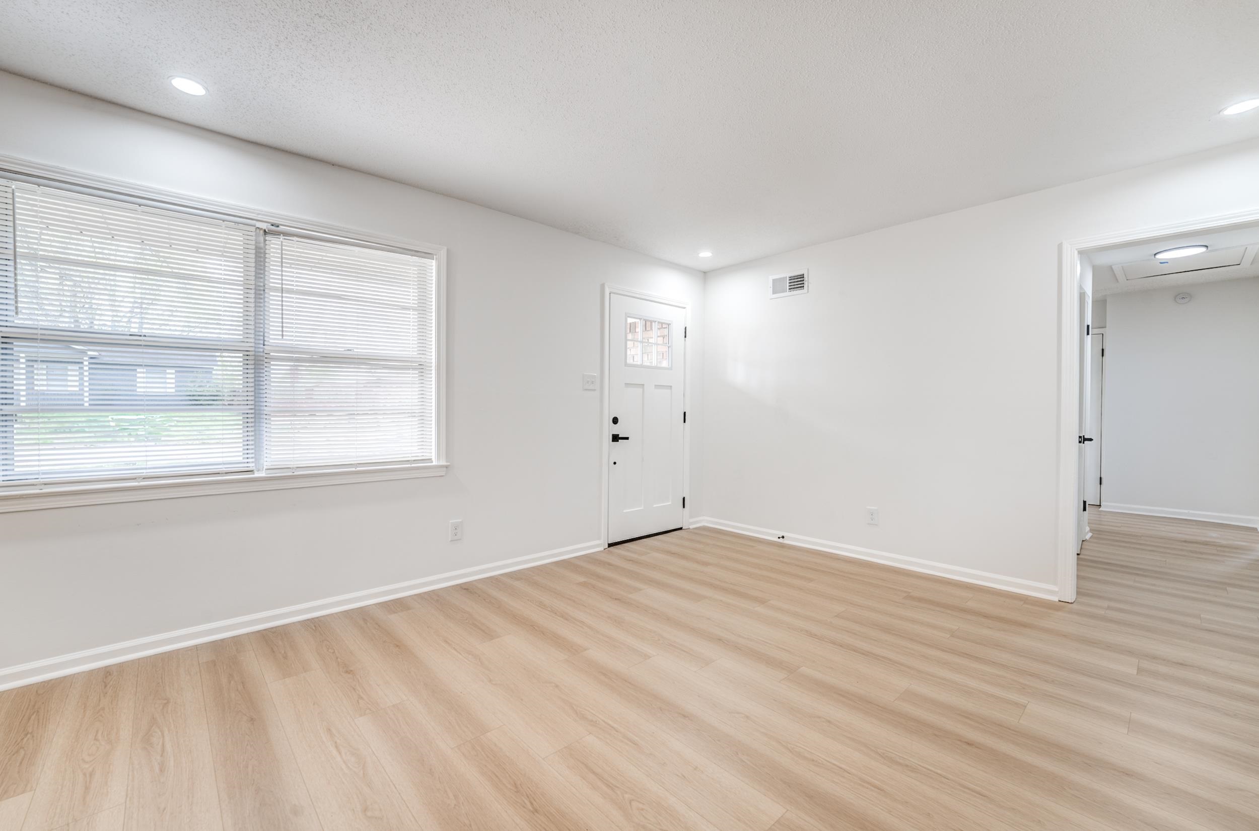 5156 Windcrest Road Memphis, TN 38116 - Photo 6 of 24 Foyer entrance with light wood-type flooring and recessed lighting