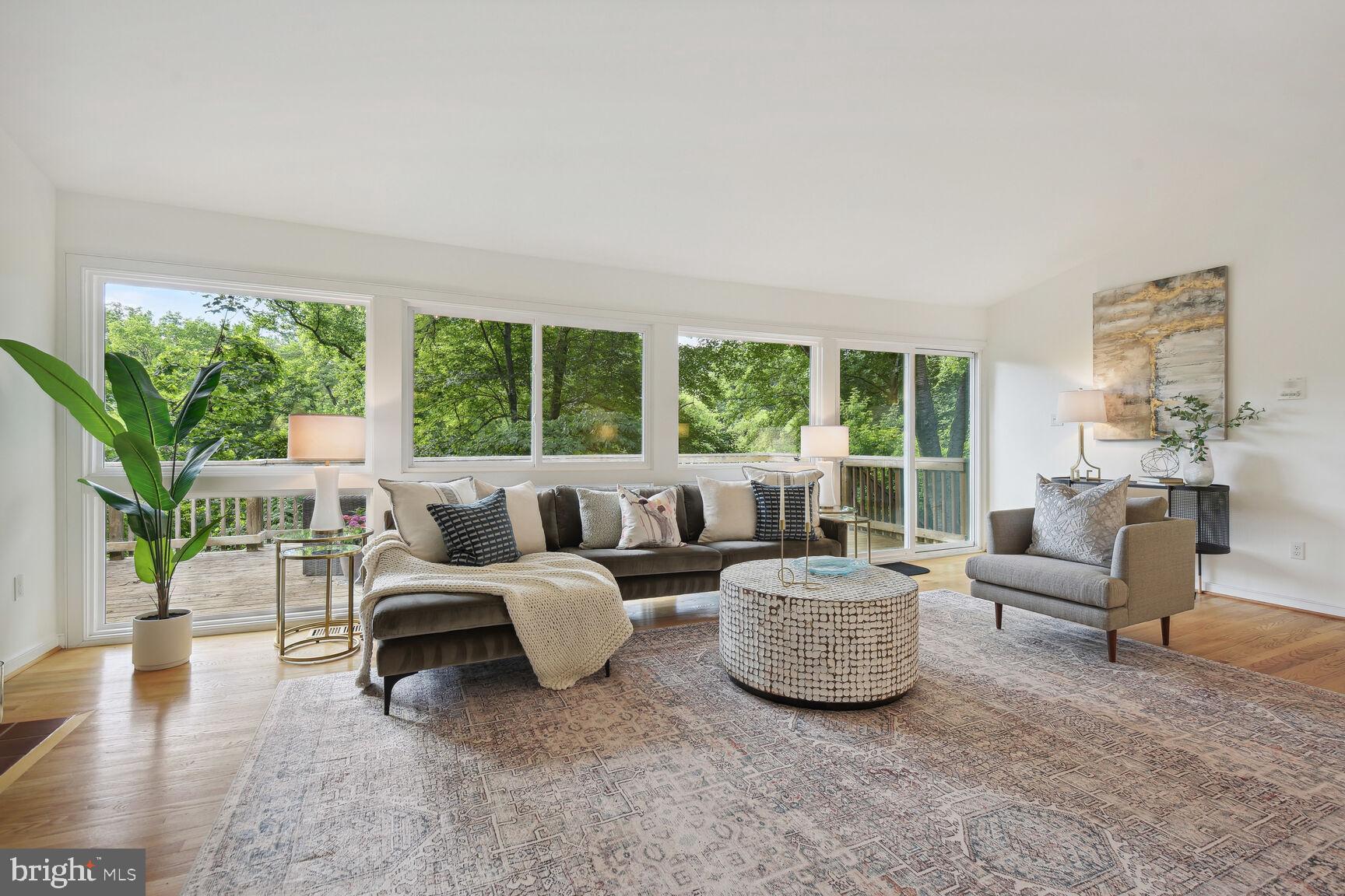7705 Glenmore Spring Way Bethesda, MD 20817 - Photo 10 of 30 Living Room with access to Deck