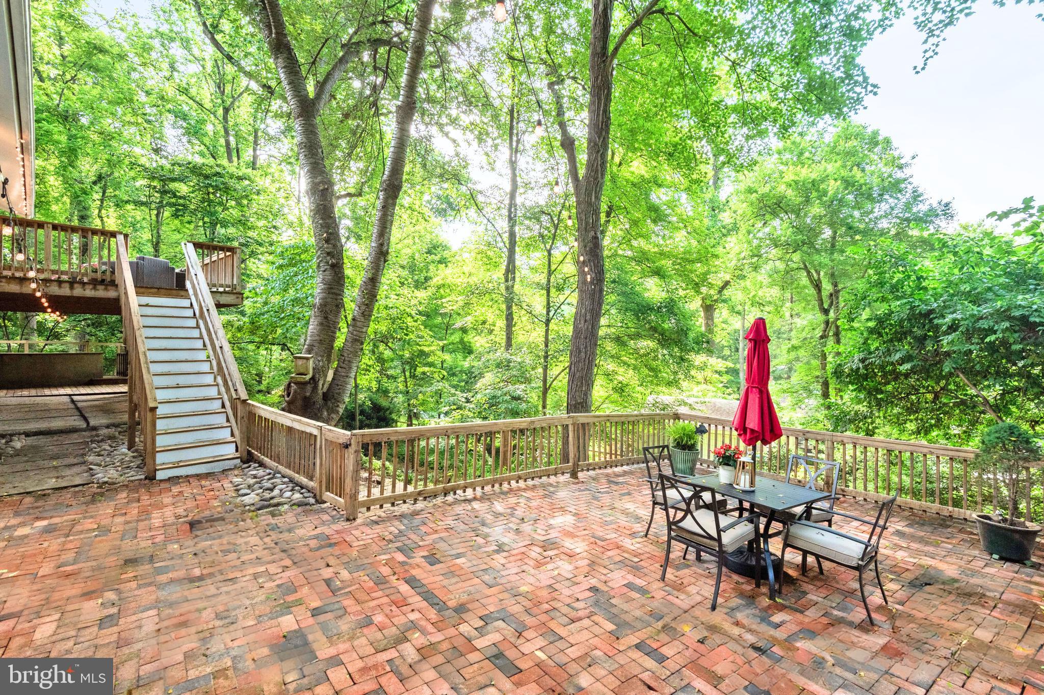 7705 Glenmore Spring Way Bethesda, MD 20817 - Photo 14 of 30 Deck access to the Brick Patio